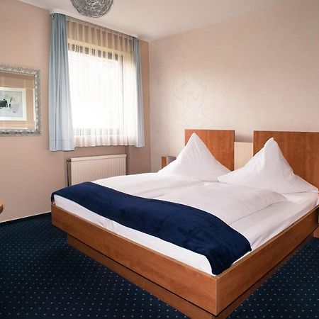 Hotel Garni Haus Schoenberger Heiligenhaus Bagian luar foto