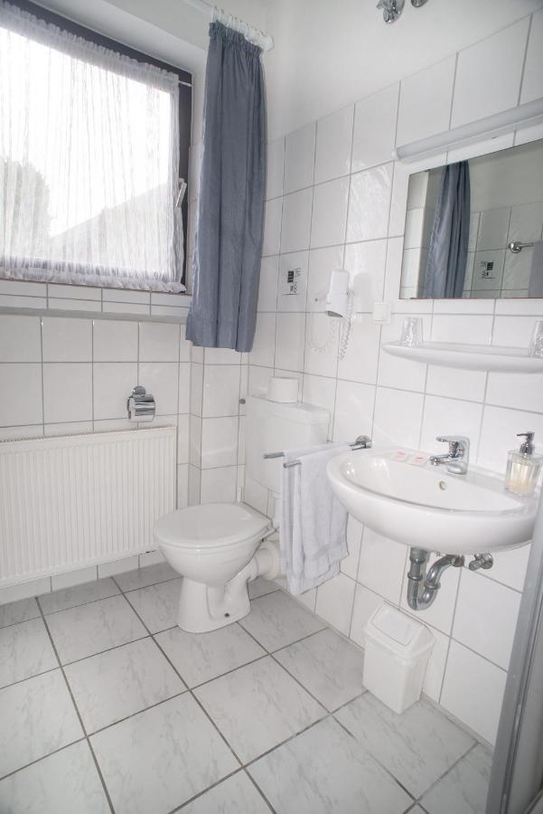 Hotel Garni Haus Schoenberger Heiligenhaus Bagian luar foto